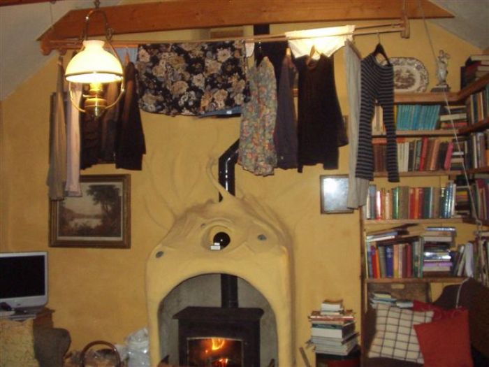 Drying laundry over a peat fire