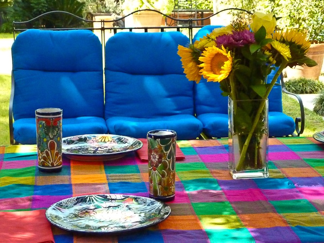 Brightly colored table setting with sunflowers