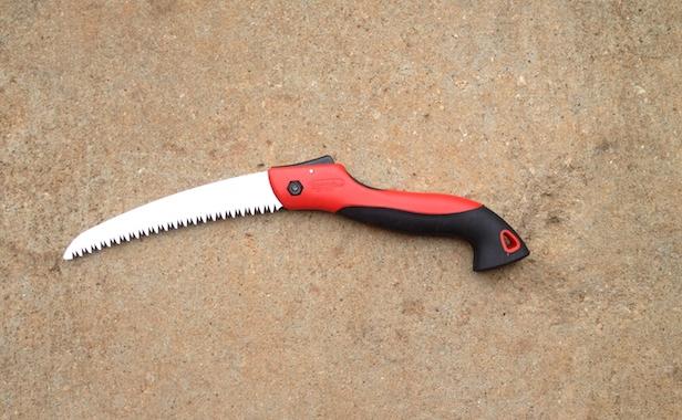 a pruning saw is a good tool for rose gardens